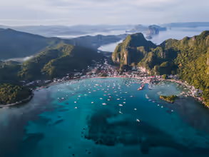 landscape photography of island with boats